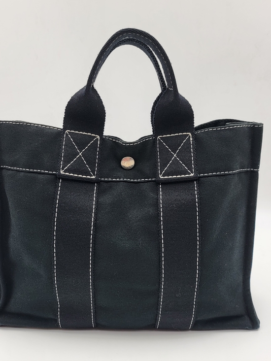 Hermes Handbags - HERMES Black Canvas Herline PM Tote Bag, Authentic w/COA.